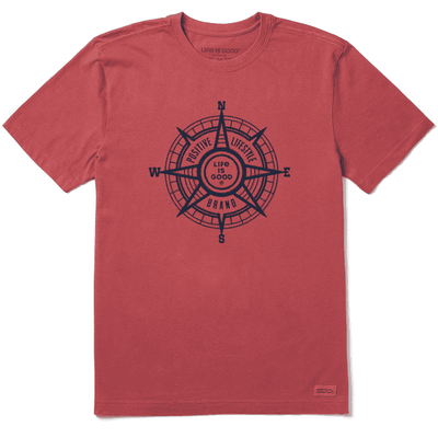 Life is Good®. It has a compass design on the front with the text “LIFESTYLE” written above it and “POSITIVE” written below it. There is also a small Life is Good®  text logo on the left sleeve.