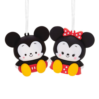 Two Disney Mickey Mouse and Minnie Mouse Christmas ornaments. Mickey Mouse has black ears, red shorts, and yellow shoes.