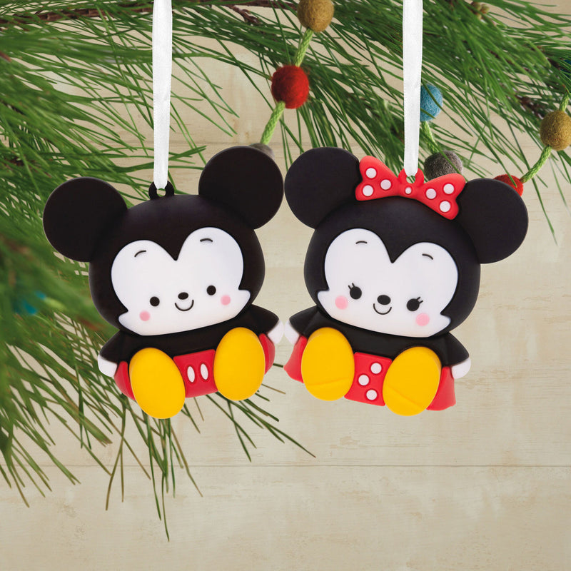Two Disney Mickey Mouse and Minnie Mouse Christmas ornaments. Mickey Mouse has black ears, red shorts, and yellow shoes.