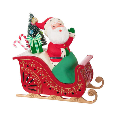 Vintage-style Santa in red sleigh with gifts and lighted base, part of ShowToppers musical tree topper system with synchronized effects.