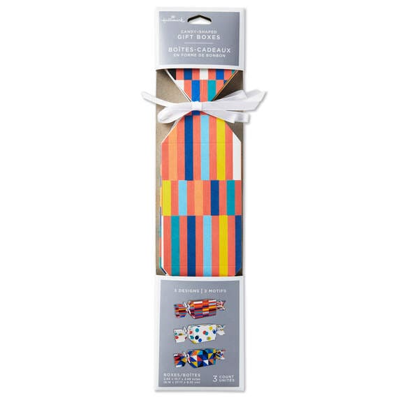 Set of 3 colorful candy-shaped party favor boxes with stripes, dots, and triangle patterns, including white satin ribbon ties
