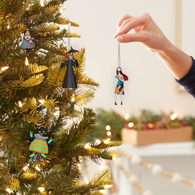 Set of four Nightmare Before Christmas Halloween ornaments with Sally, Mayor, Harlequin Demon, and Vampire characters

