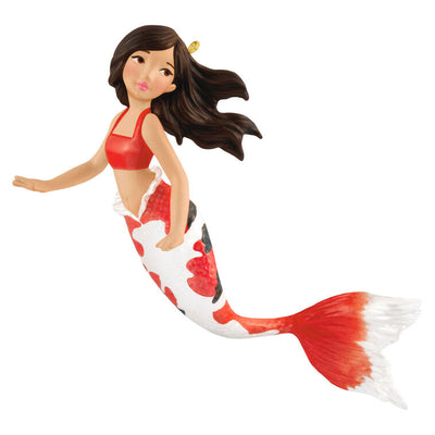Hallmark Keepsake mermaid ornament with red and black iridescent tail, brunette hair, and white top in floating holiday pose.