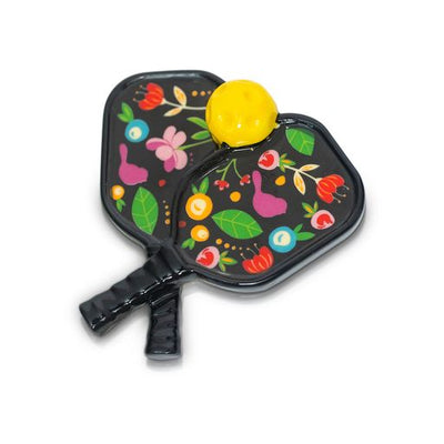 Nora Fleming pickleball paddle mini with green ball detail; sporty table accent for fans of pickleball; hand wash only.

