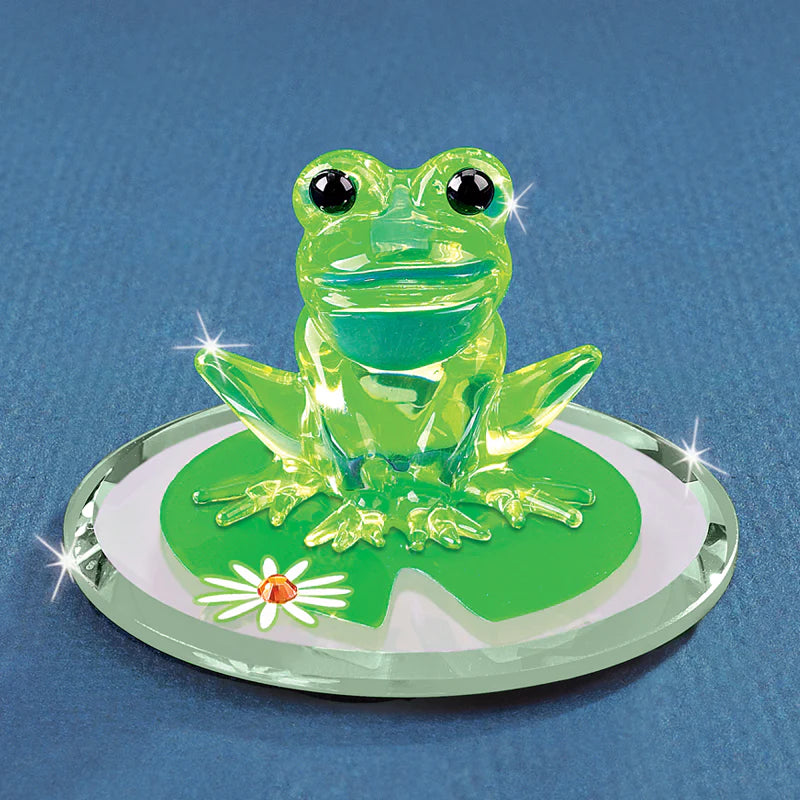 Handcrafted glass frog figurine on a hand beveled glass mirror accented with genuine crystals.