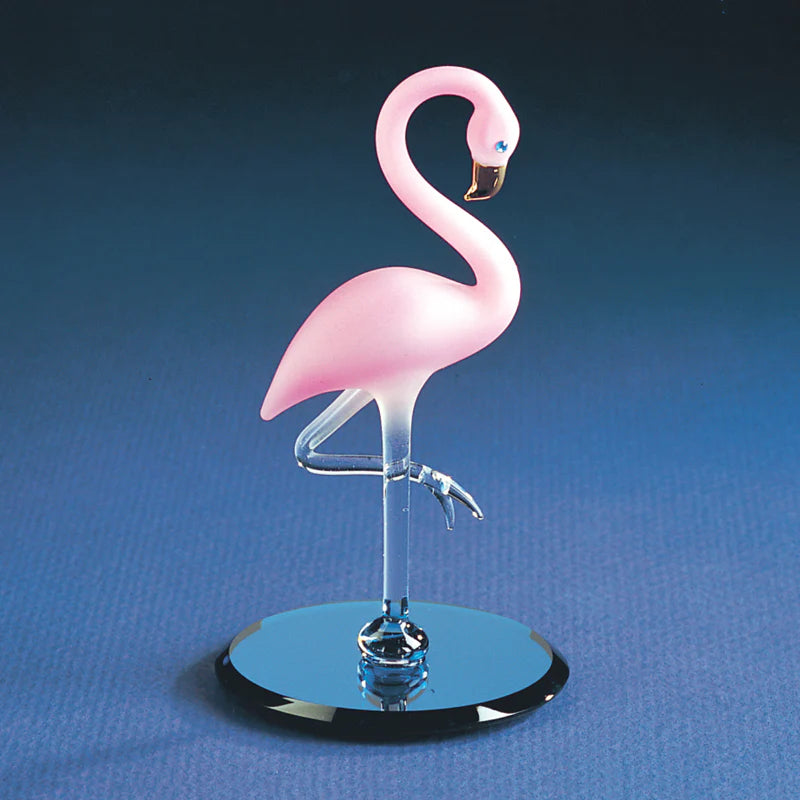 Glass flamingo figurine with crystal accents on a beveled glass mirror base.