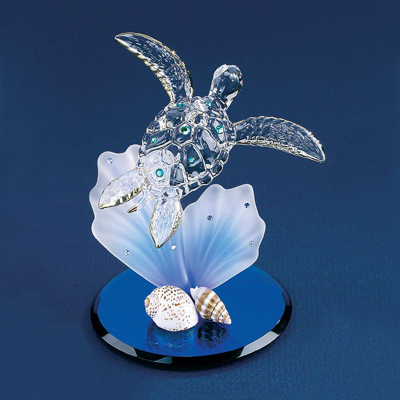 Handcrafted glass sea turtle on blue coral with crystals, 22kt gold accents, shells, on beveled blue glass base.