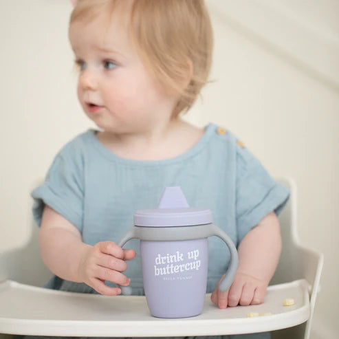 Bella Tunno Drink Up Buttercup Happy Sippy Cup made of durable food-safe silicone with removable handles, soft spout.