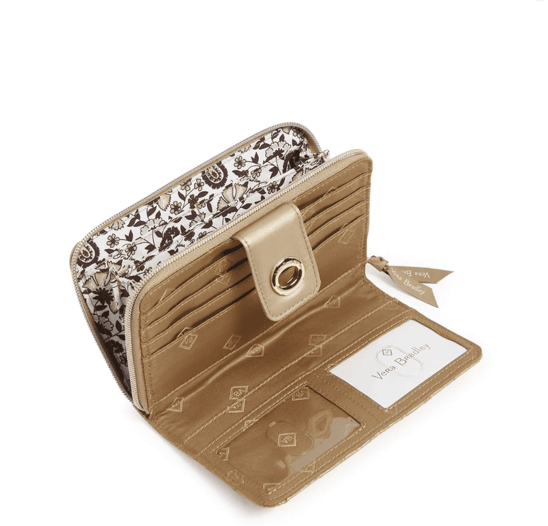 Pearlized nylon Vera Bradley RFID Turnlock Wallet with zip coin pocket, 12 card slips, bill slips, and two ID windows