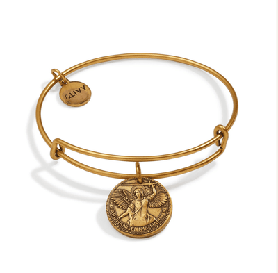 Gold bangle bracelet with a St. Michael medallion.