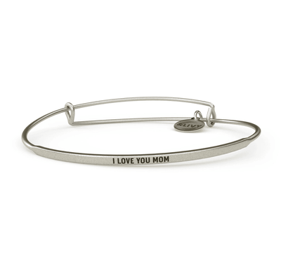 Silver bangle bracelet with a diamond-shaped charm and the word "Mom" engraved on it
