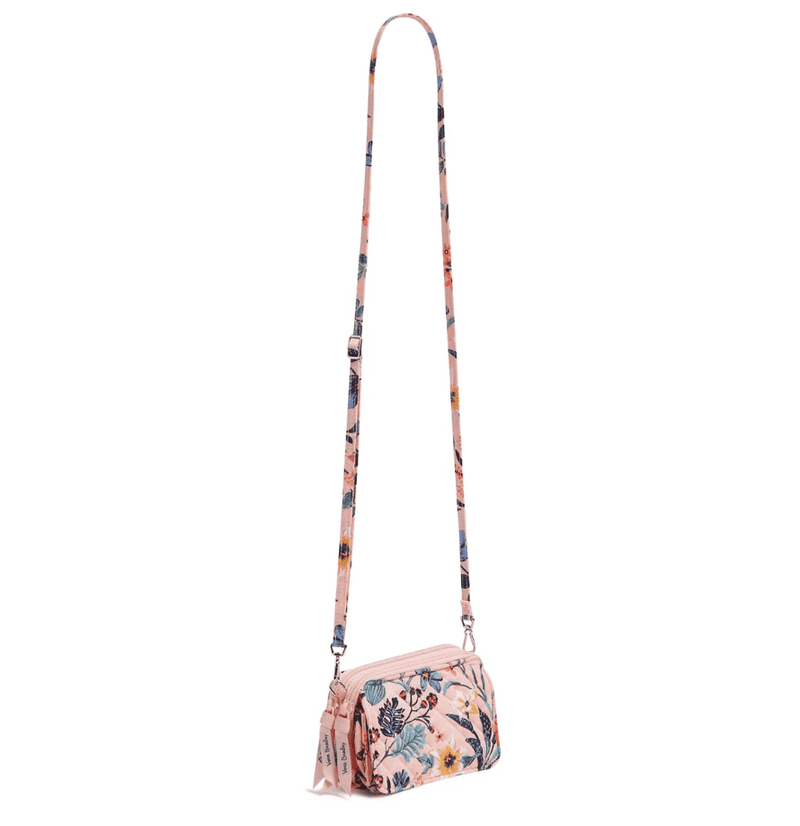 Vera Bradley RFID wallet crossbody in Paradise Coral with quilted cotton, multiple card slots, phone pocket, and zip closure.