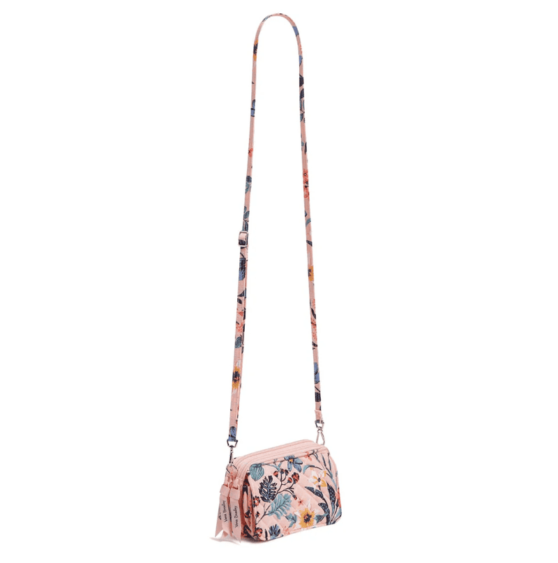 Vera Bradley RFID All in One crossbody in Paradise Coral quilted cotton with card slots, phone pocket, and adjustable strap.
