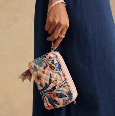 Vera Bradley RFID All in One crossbody in Paradise Coral quilted cotton with card slots, phone pocket, and adjustable strap.
