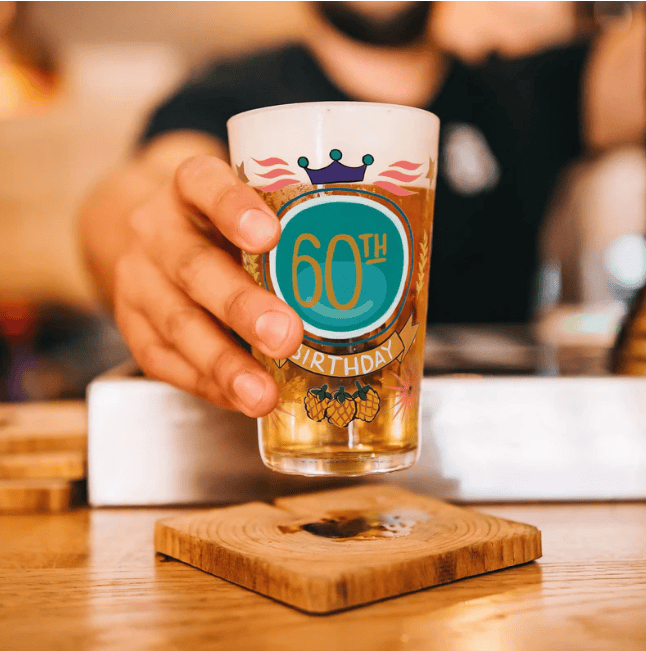 60th Birthday pint glass with crown and stars, hand-painted, holds 16 oz


