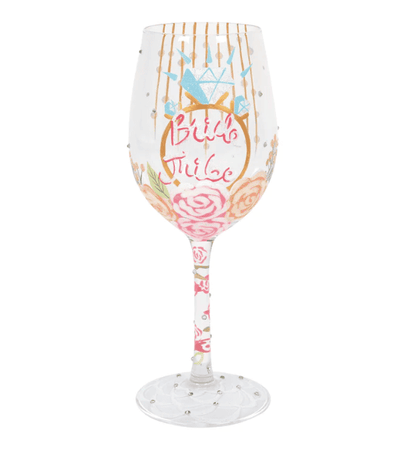 A Lolita brand wine glass with a hand-painted