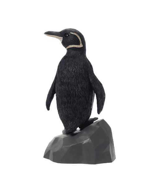  penguin standing on a rock with a star on it".
