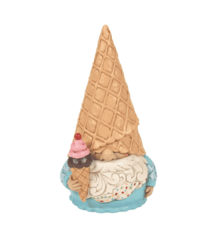 Small figurine of a gnome wearing a melted ice cream cone as a hat
