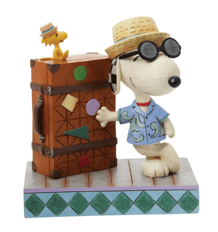 Jim Shore Snoopy and Woodstock vacation figurine with suitcase, Hawaiian shirt, and straw hats, hand-painted in folk art style.