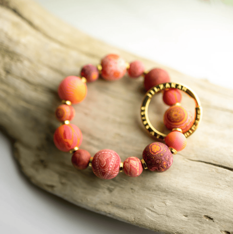Savannah Red Small Bead Wrist Keychain with handcrafted polymer clay beads and stretch elastic for hands-free key .