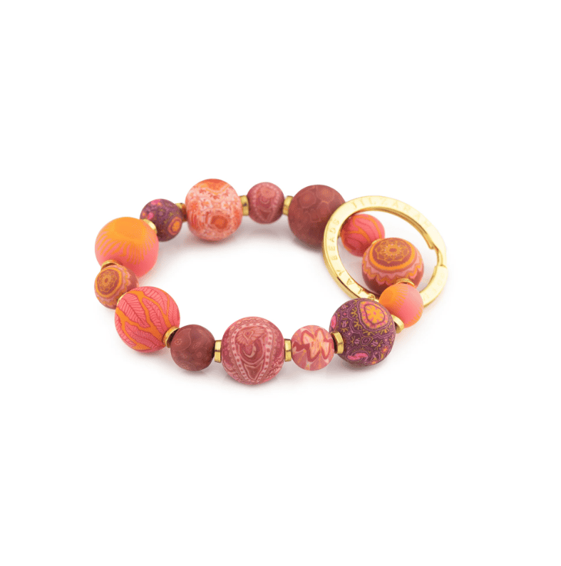 Savannah Red Small Bead Wrist Keychain with handcrafted polymer clay beads and stretch elastic for hands-free key .
