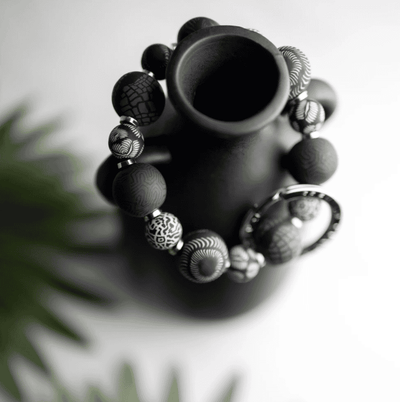 Midnight Small Bead Wrist Keychain with handcrafted black polymer clay beads, metal spacers, and stretch elastic.