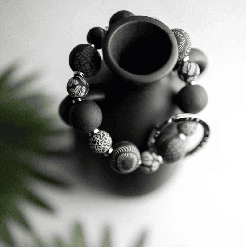 Midnight Small Bead Wrist Keychain with handcrafted black polymer clay beads, metal spacers, and stretch elastic.