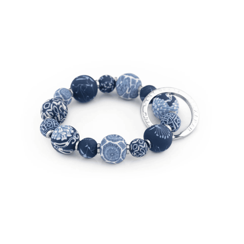 Dutch Blue Small Bead Wrist Keychain with handcrafted blue polymer clay beads, sleek metal spacers, and stretch elastic.