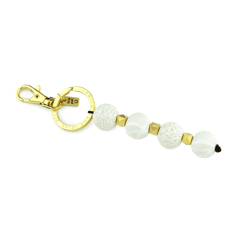 Ivory Palm 4-Ball Keychain with handcrafted 18mm clay beads, metal spacers, split ring, charm, and lobster-claw clip.