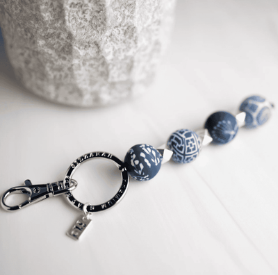 Blue 4-Ball Keychain with handcrafted clay beads, silver spacers, split ring, “Life is Good” charm, and lobster-claw clip.