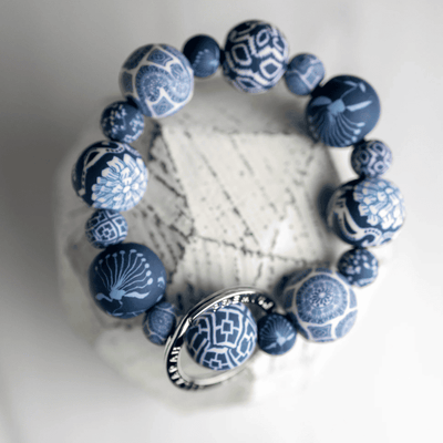 Blue Wrist Keychain with handcrafted clay beads, durable elastic cord, and silver key ring featuring JILZARAH logo.