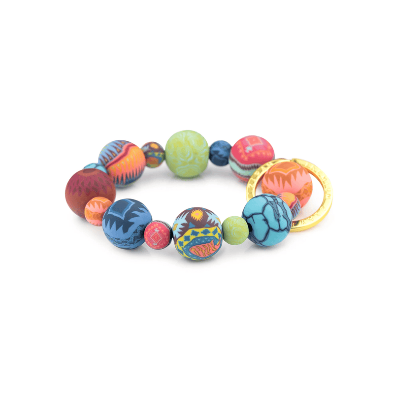 Sedona Sky Wrist Keychain with handcrafted clay beads, elastic cord, and silver key ring featuring JILZARAH logo