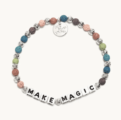 M/L bracelet with Make Magic letter beads and matte lava rock beads, designed to strengthen intuition and clear the mind.
