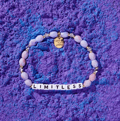 M/L bracelet with Limitless letter beads and galaxy-inspired marble beads, designed to activate inner strength and empower the wearer.

