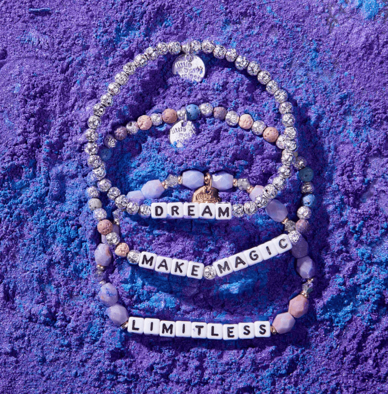 M/L bracelet with Limitless letter beads and galaxy-inspired marble beads, designed to activate inner strength and empower the wearer.
