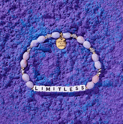 S/M Limitless Galaxy bracelet with marble-like galaxy-inspired beads symbolizing empowerment and limitless potential.
