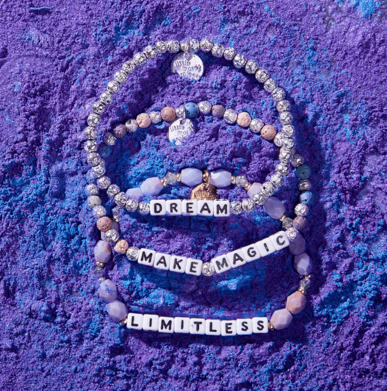 S/M Limitless Galaxy bracelet with marble-like galaxy-inspired beads symbolizing empowerment and limitless potential.
