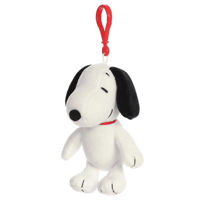 Small white Snoopy plush keychain with red clip, featuring classic Peanuts design and soft fabric by Aurora.