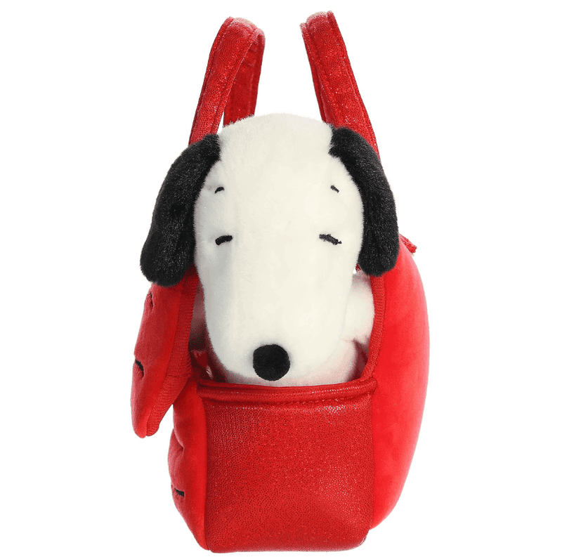Snoopy plush inside red doghouse carrier, soft and portable Fancy Pals Peanuts toy by Aurora.