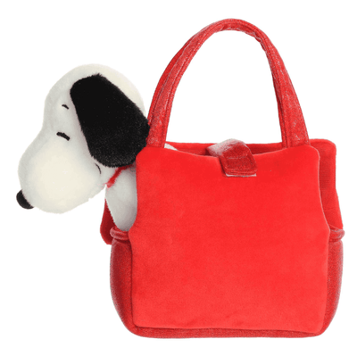 Snoopy plush inside red doghouse carrier, soft and portable Fancy Pals Peanuts toy by Aurora.