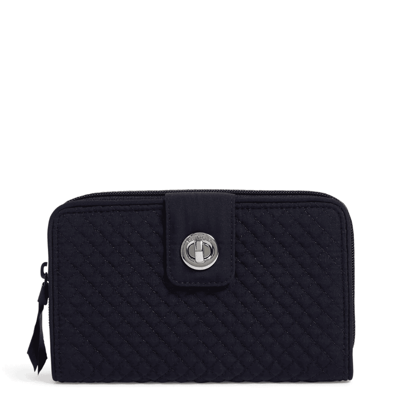 Classic navy Vera Bradley RFID turnlock wallet with card slots, zip coin pocket, and microfiber finish