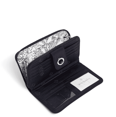 Classic navy Vera Bradley RFID turnlock wallet with card slots, zip coin pocket, and microfiber finish