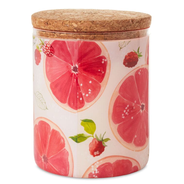 Sparkling citrus scented 2-wick jar candle with pink grapefruit design and cork lid