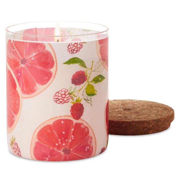 Sparkling citrus scented 2-wick jar candle with pink grapefruit design and cork lid