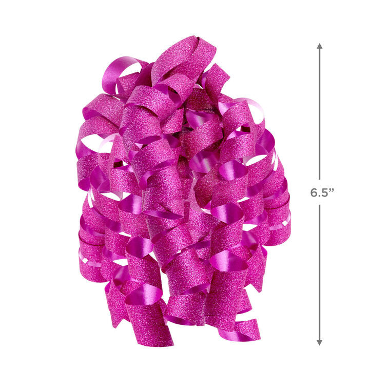 Hallmark pink curly gift bow with glittery corkscrew ribbon strands and self-adhesive backing, perfect for wrapped birthday presents.