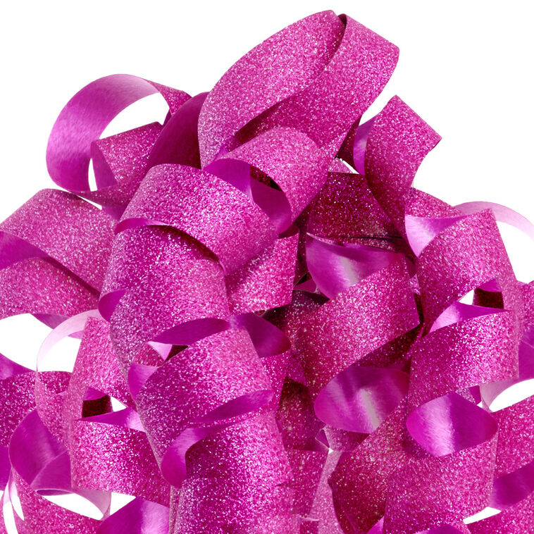 Hallmark pink curly gift bow with glittery corkscrew ribbon strands and self-adhesive backing, perfect for wrapped birthday presents.