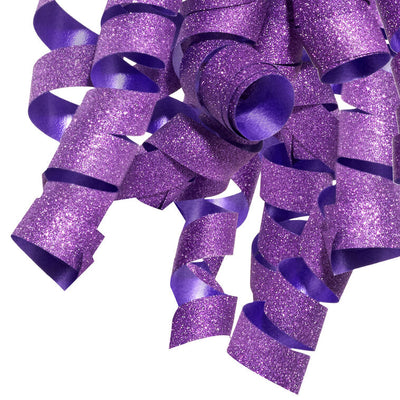 Hallmark purple curly gift bow with glittery corkscrew ribbon strands and self-adhesive backing, ideal for wrapped birthday gifts.