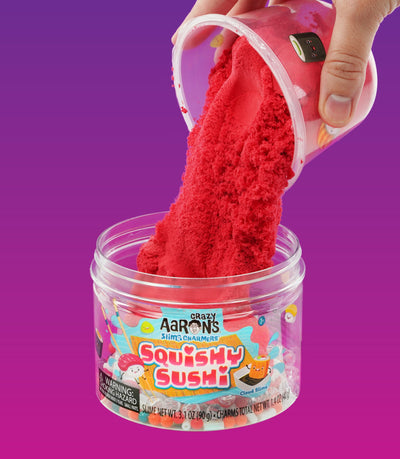 Crazy Aaron’s Squishy Sushi Slime Charmers with sushi charms, cloud slime, strawberry scent, and stretchy, satisfying sensory play