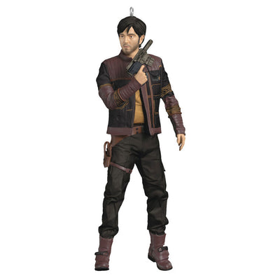 Cassian Andor Christmas ornament holding blaster, wearing brown tactical gear and scarf