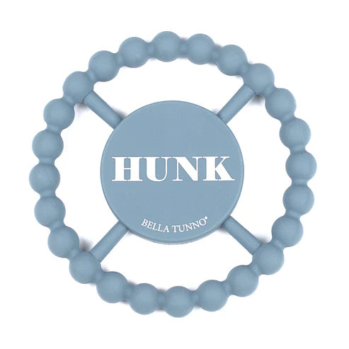 Round silicone teether with the word "Hunk" printed on it, designed for babies with easy grip and textured surface.